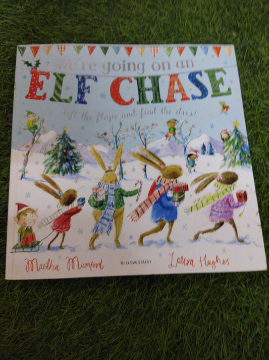 We're going on an  ELF CHASE lift the flaps and find the elves !